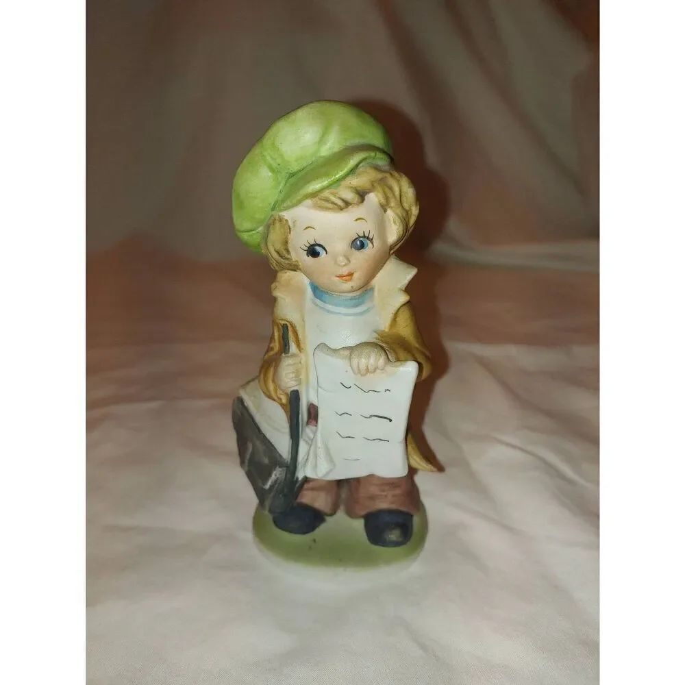 Vintage Porcelain Newspaper Boy Figurine